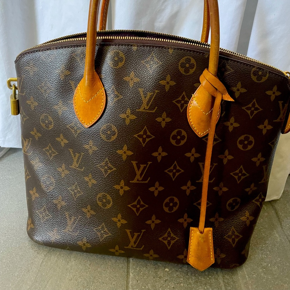 Authentic Louie Vuitton.